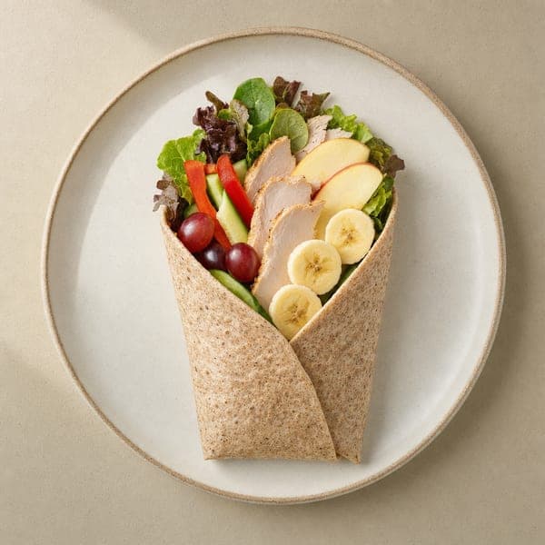 Wrap z pieczonym indykiem i świeżymi owocami do lunchboxu