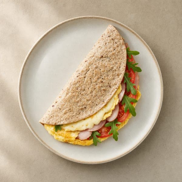 Wysokobiałkowa tortilla z szynką drobiową i jajkiem